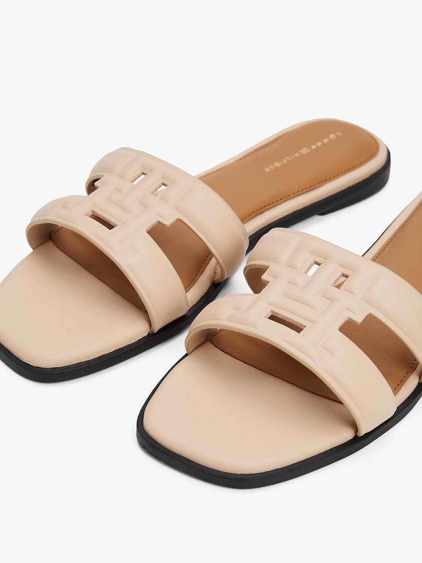 Mules en cuir à monogramme TH