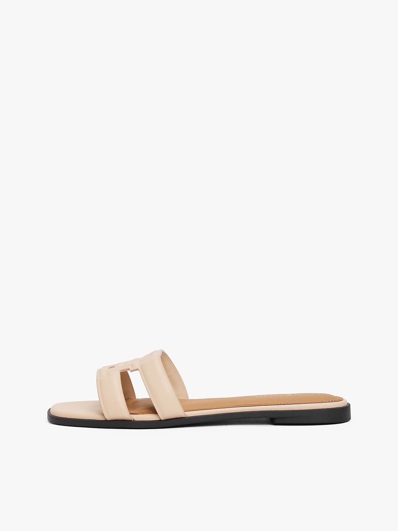 Mules en cuir à monogramme TH