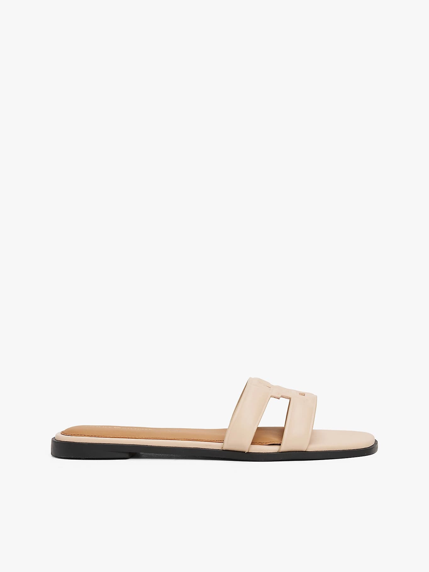 Mules en cuir à monogramme TH