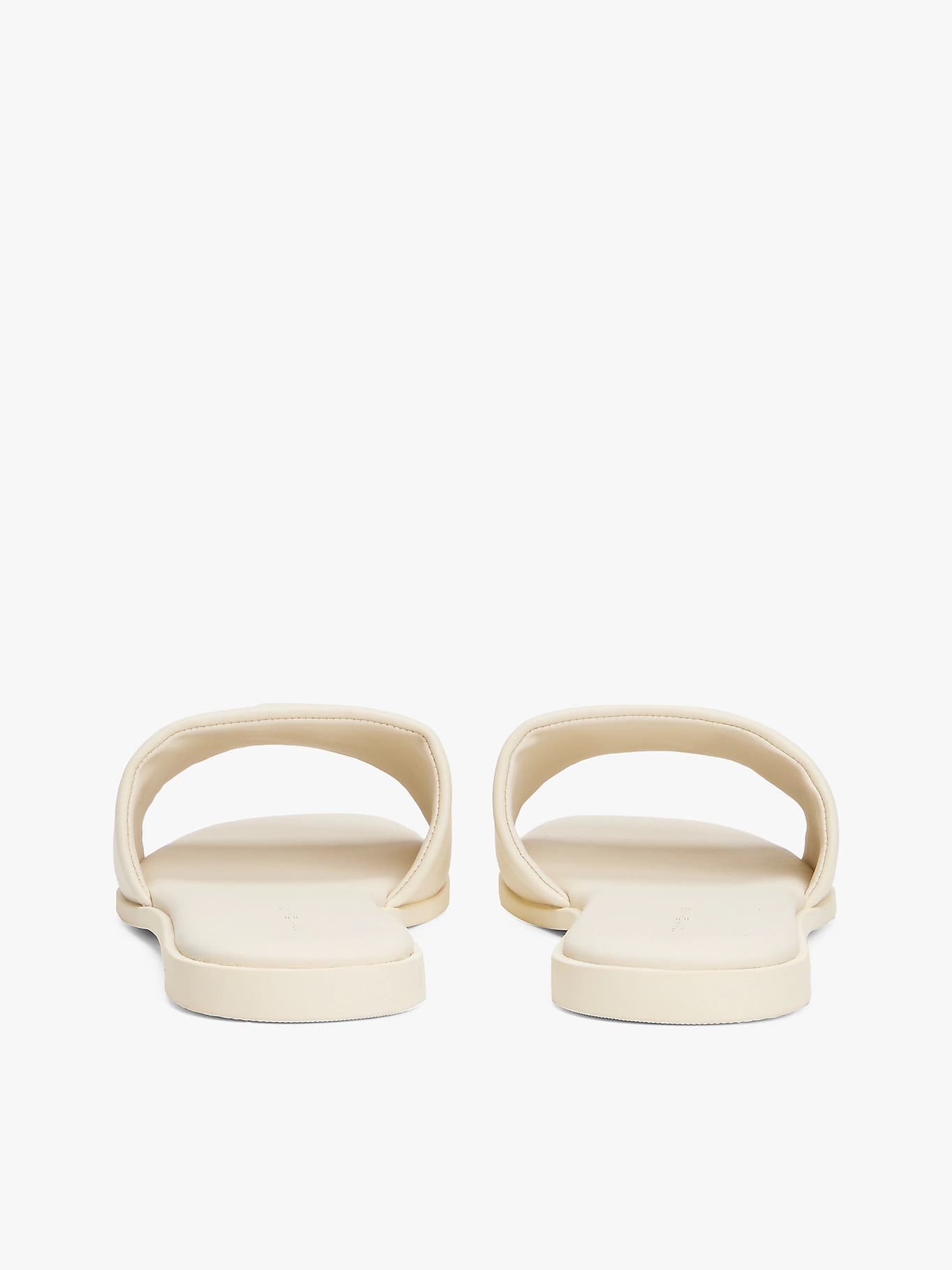 Mules en cuir à monogramme TH
