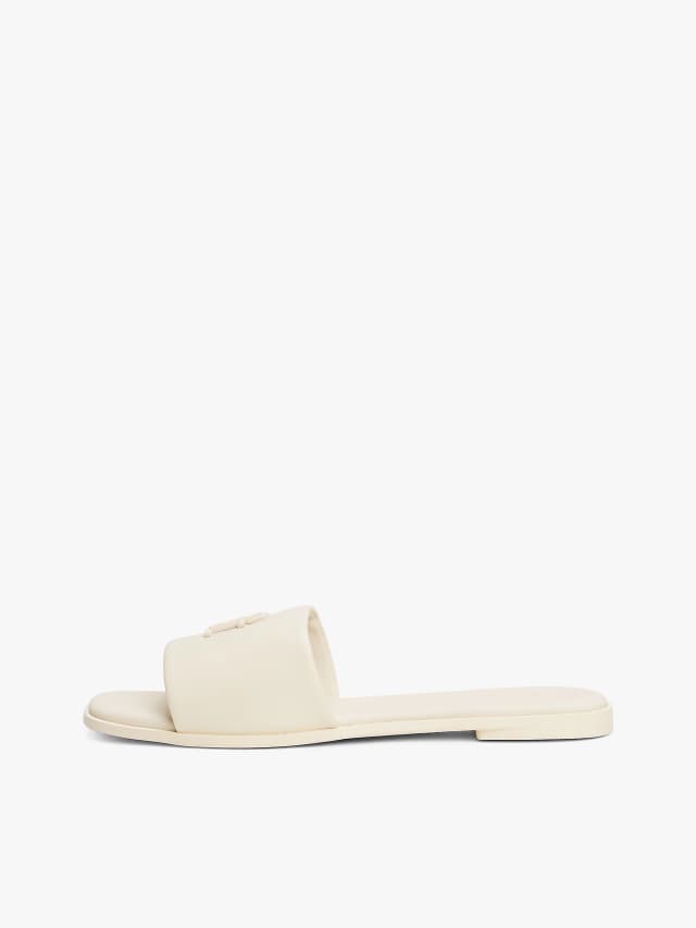 Mules en cuir à monogramme TH