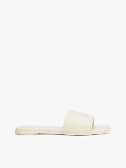 Mules en cuir à monogramme TH