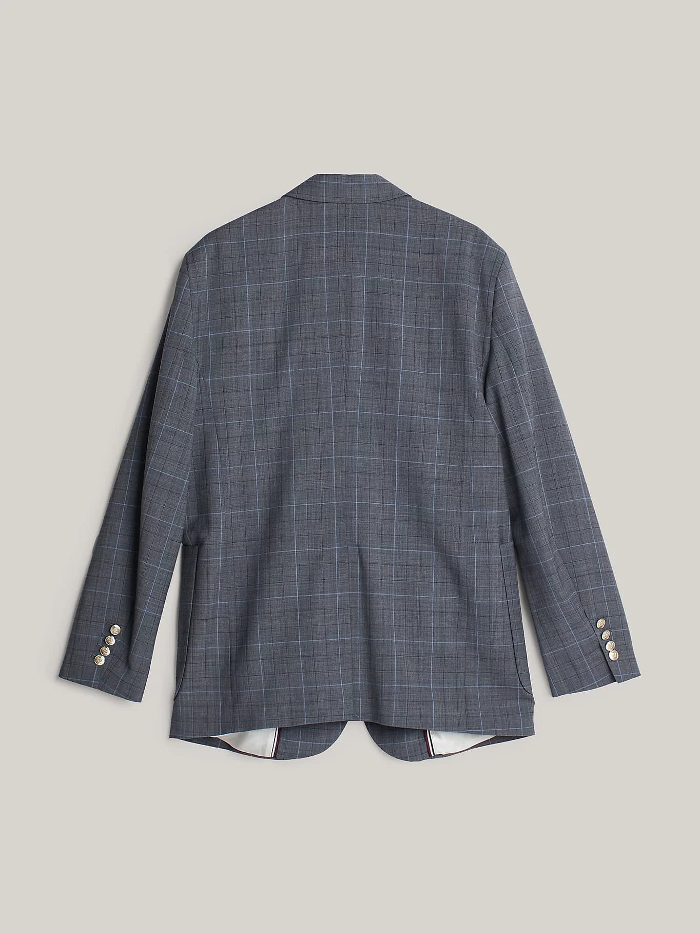 Blazer droit à carreaux et blason